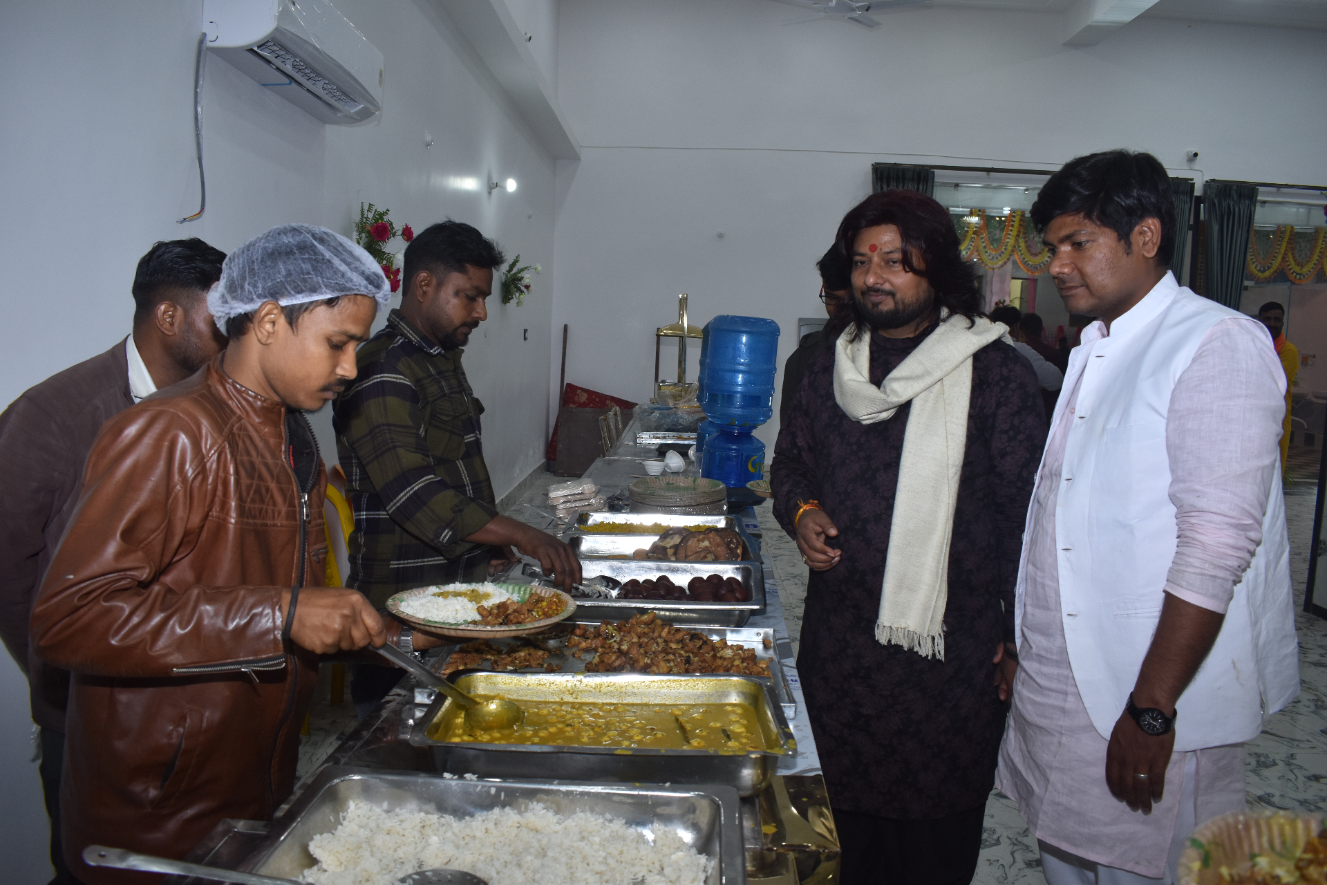 Guests served at the grand buffet spread